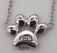 Sterling silver paw print necklace on adjustable chain